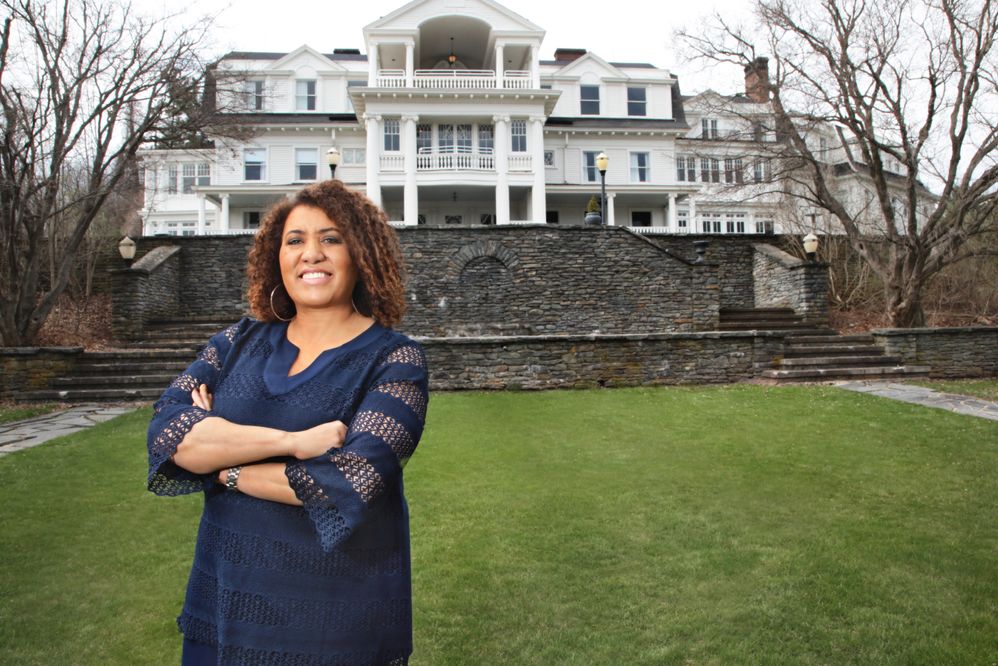 CEO Monique Greenwood on the grounds of Akwaaba’s Mansion at Noble Lane