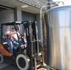 Moving a cold brew tank at the brewing facility