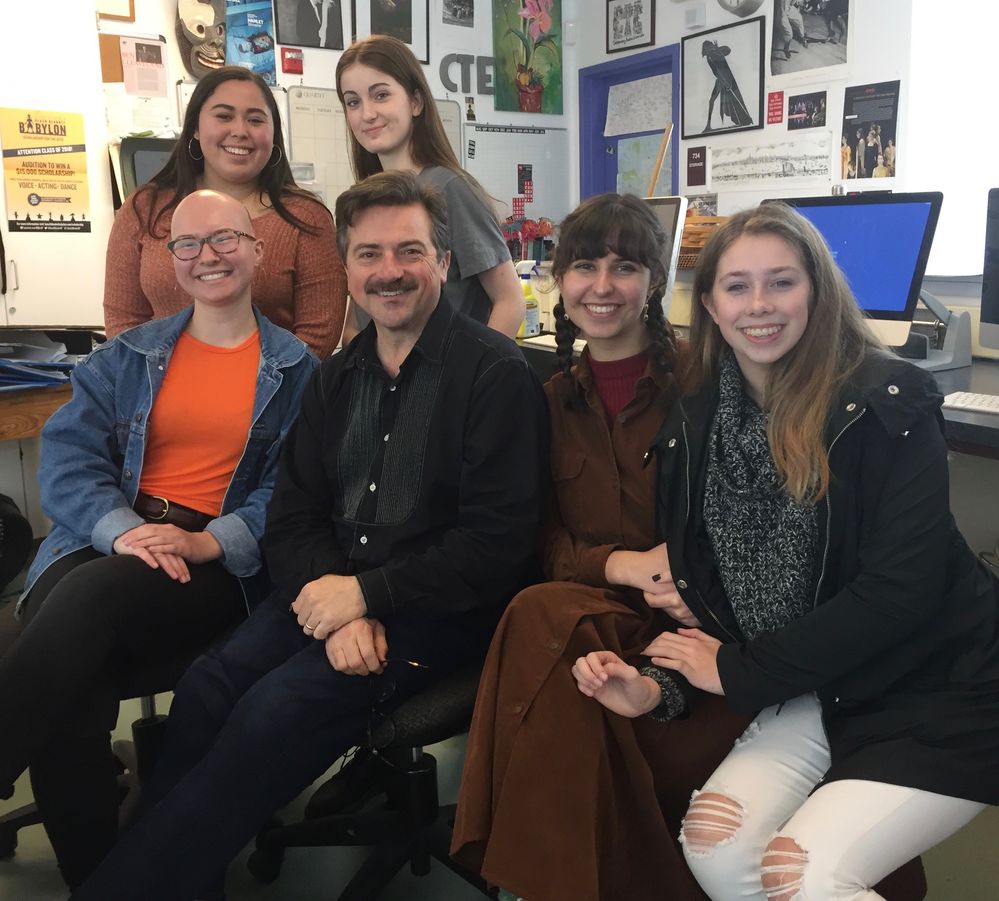 CTE director Ben Cleaveland with board co-president Maggie del Castillo (with braids) and fellow student board members