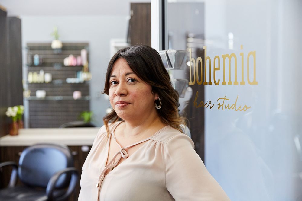 Hairstylist Brenda Maldonado welcomes clients at Bohemia Hair Studio