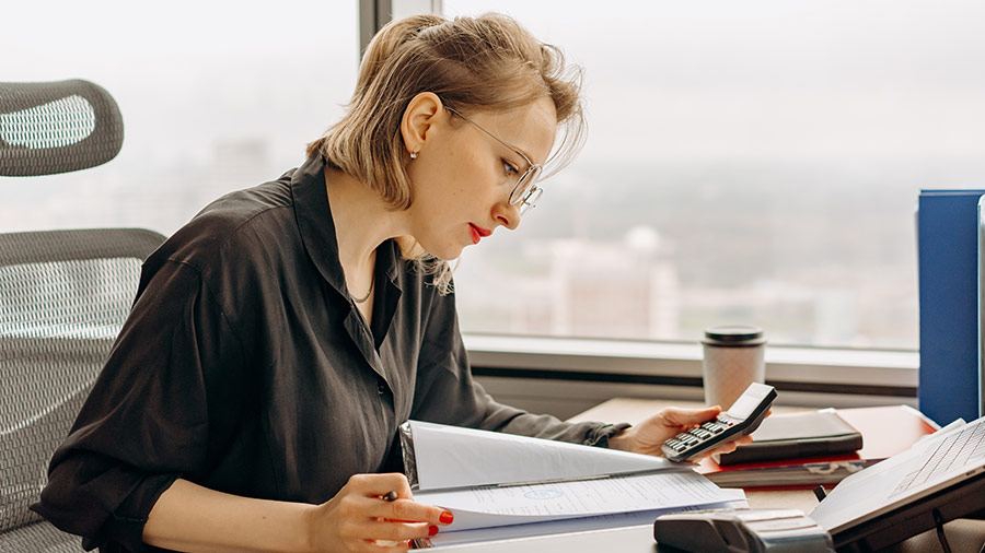 Accountant completing Fortnightly Tax Table on QuickBooks