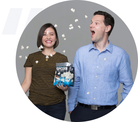 Yuliana Acevedo Rodriguesz, Owner of Barefoot Cinema, celebrates with popcorn after hiring ProAdvisor Kane through QuickBooks