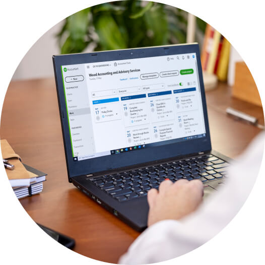 Person using laptop to streamline payroll with QuickBooks Software for accountants and accounting firms