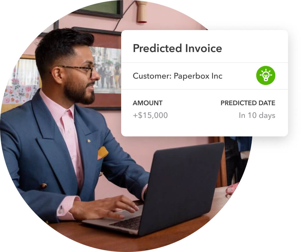Manager smiling after viewing the predicted invoice on QuickBooks.