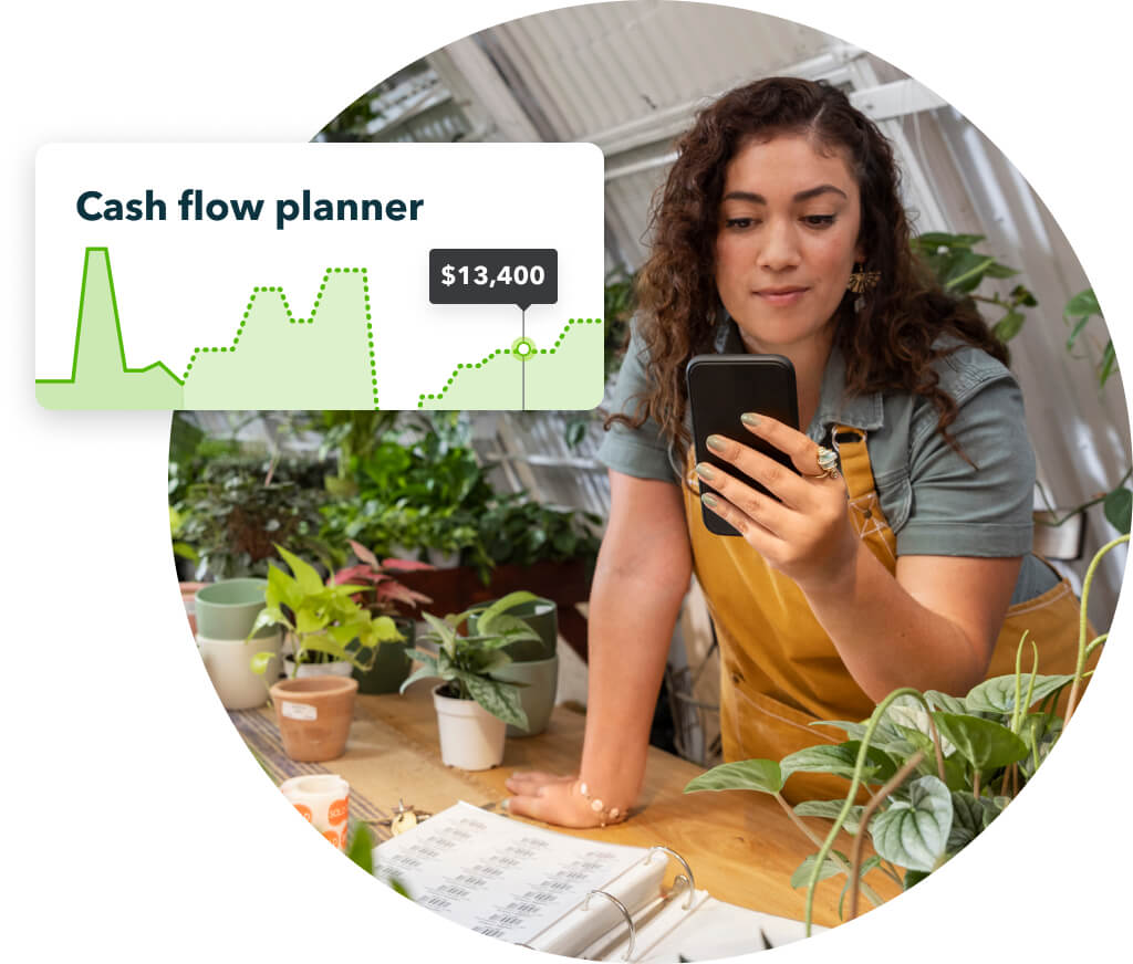 A small business owner reviewing her cash flow on the QuickBooks app with a widget preview displayed