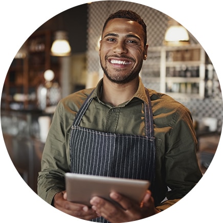 Man checking wages on tablet