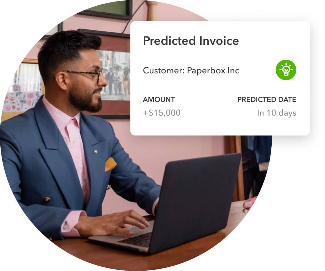 Manager smiling after viewing the predicted invoice feature on QuickBooks