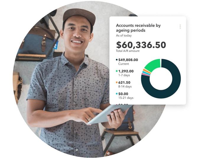 User on tablet with a preview of QuickBooks Online Advanced data tracker