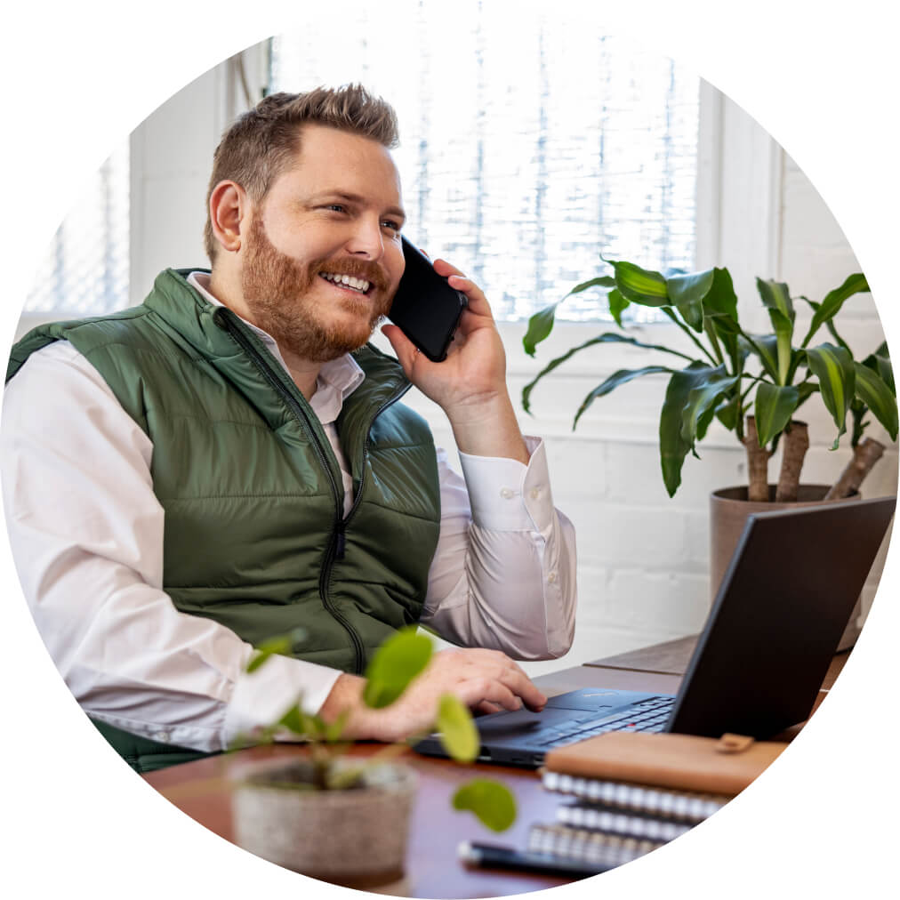 Accountant discussing advisor-only pricing with QuickBooks Online client support over the phone