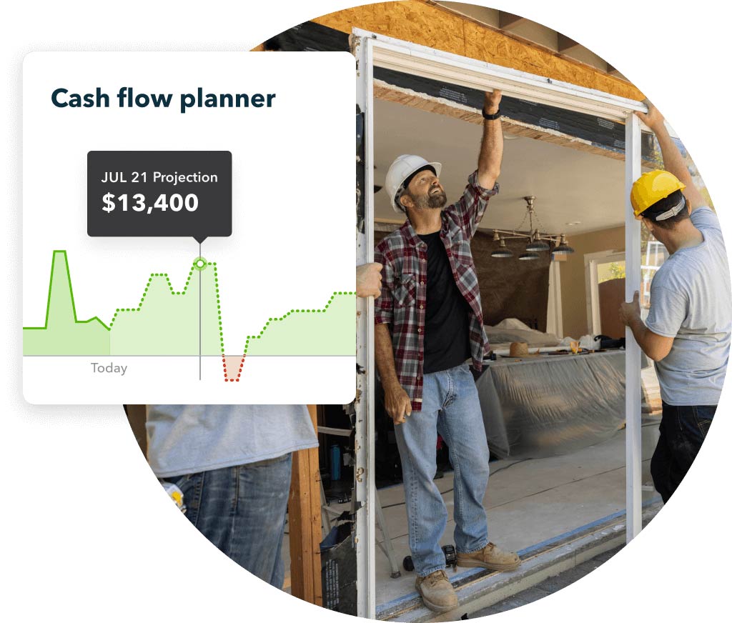 Construction manager smiling while inspecting work on a home because he viewed the cash flow planner in his QuickBooks account