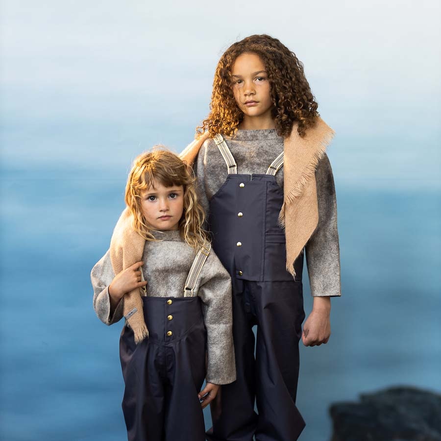 Children posing in fairechild clothing