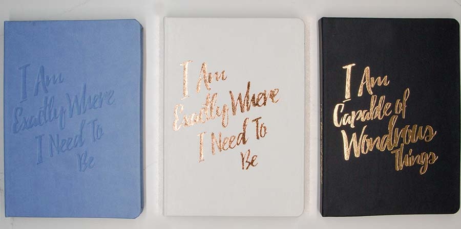 Inspirational notebooks created by PleaseNotes