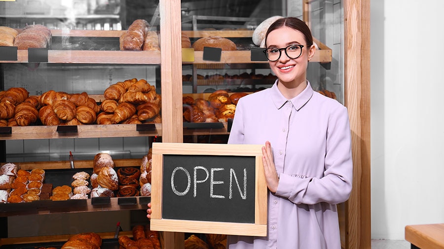 Female business owner opening her second bakery