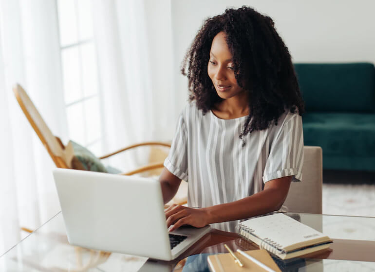 Woman work with white laptop