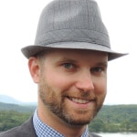 Photo of Jeff Murl wearing a stylish Trilby hat