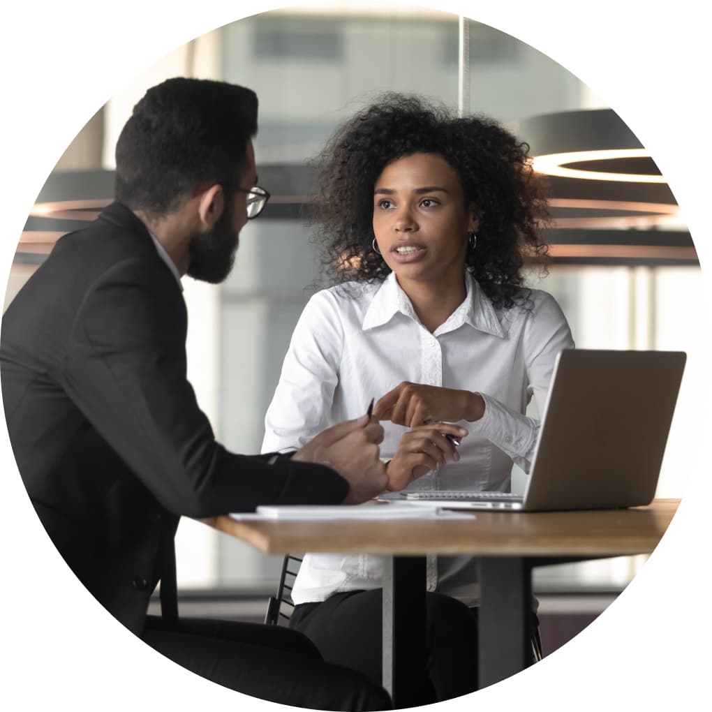 A male consultant working with female accountant.