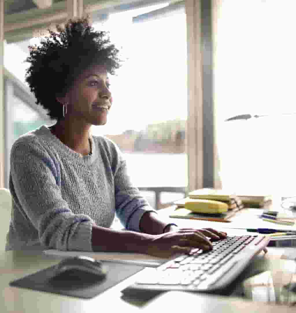 Accountant using QuickBooks Online Accountant on her computer. 