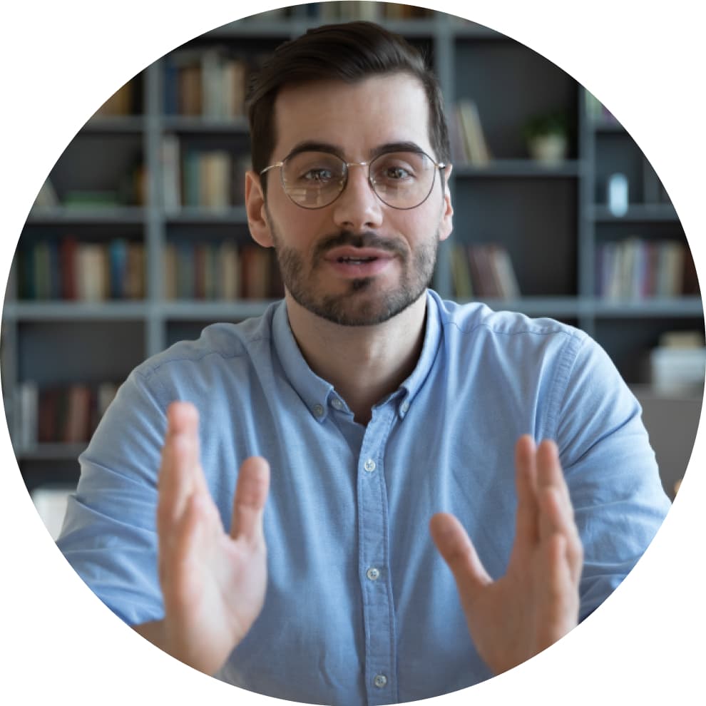 A person with glasses on his head is holding a plate.