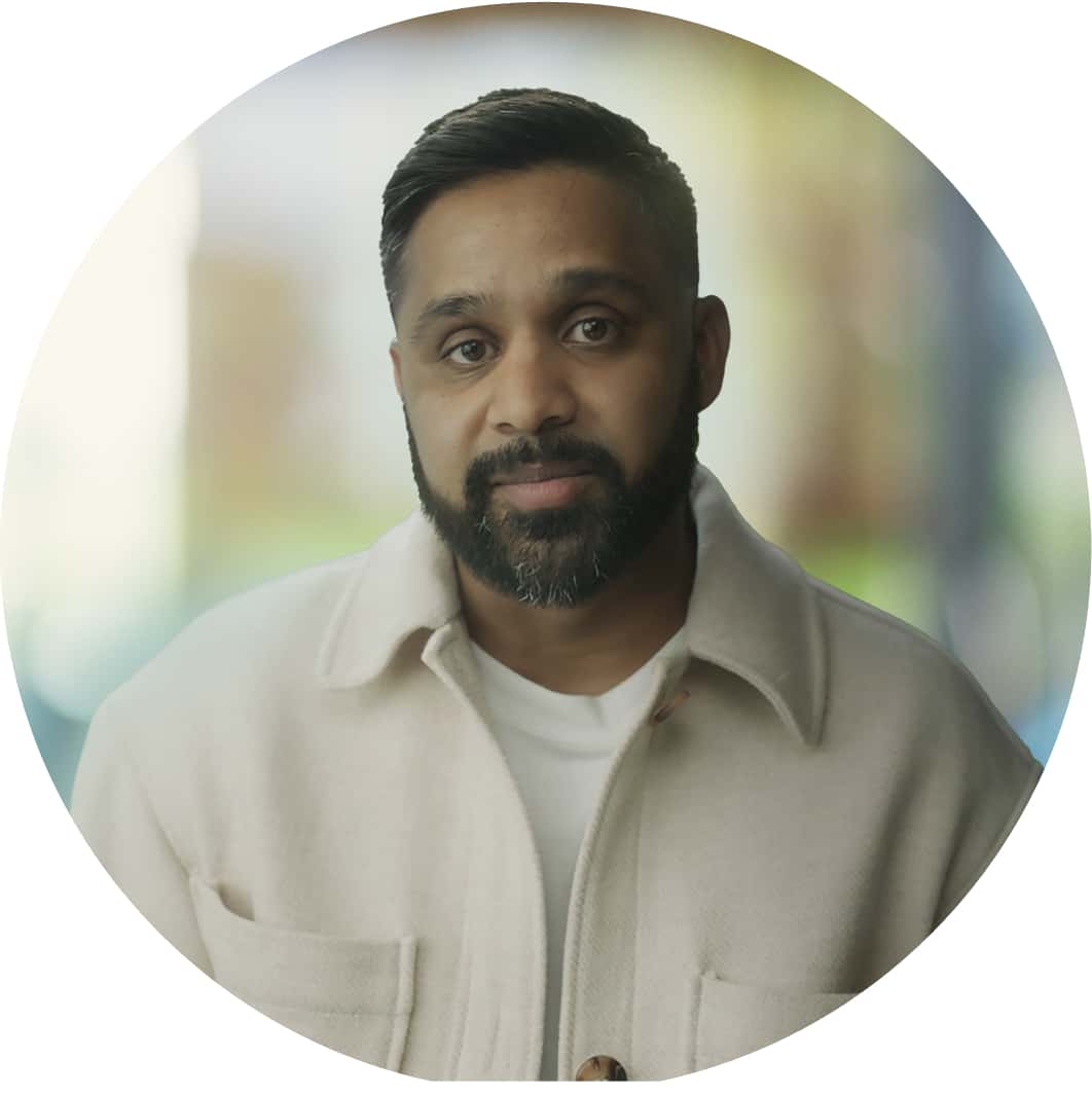 A person with a white shirt and a tie.