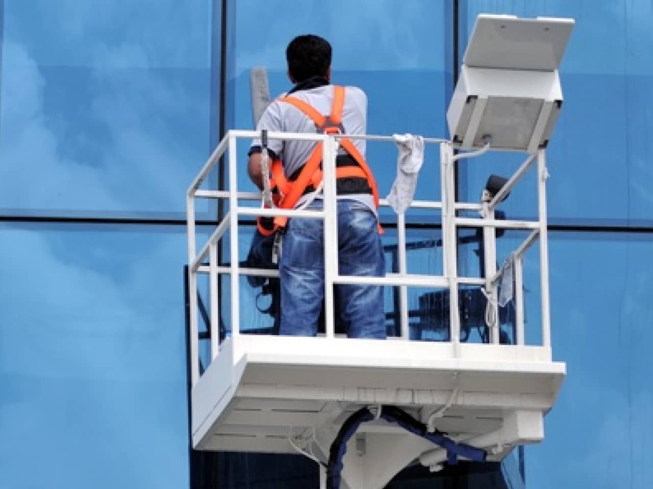 Person cleaning windows