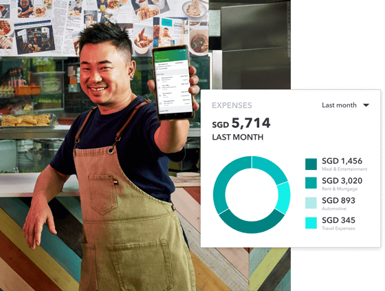 A black and white photo of a person on a cell phone.