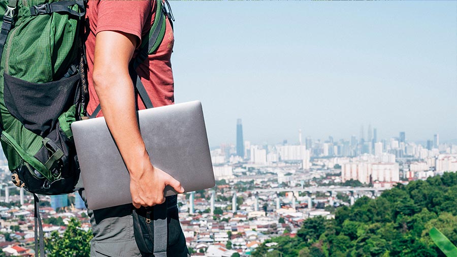 digital nomad travelling with laptop