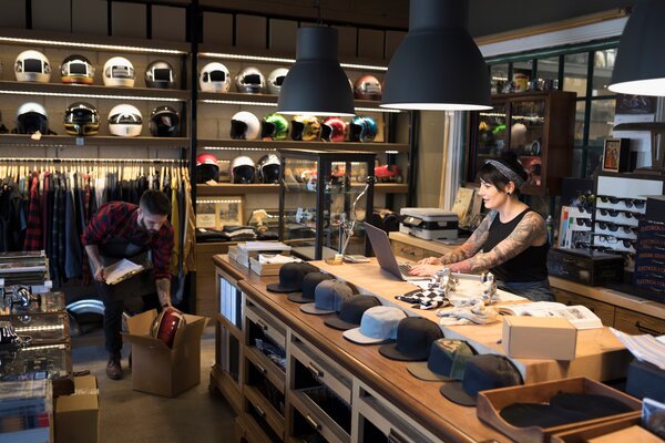 A person is looking at a display of shoes.