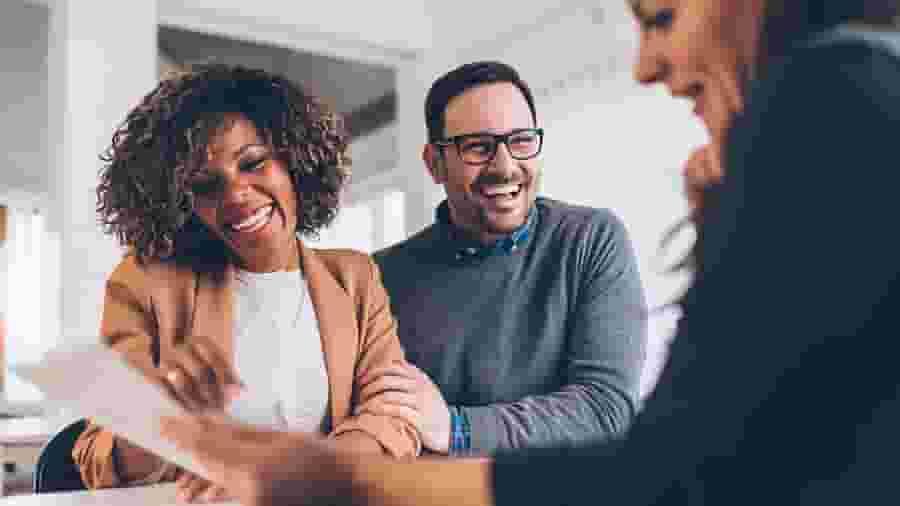 Accountant laughing with clients