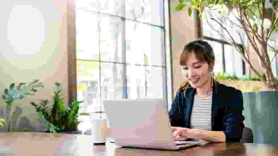 Accountant using marketing tools on laptop