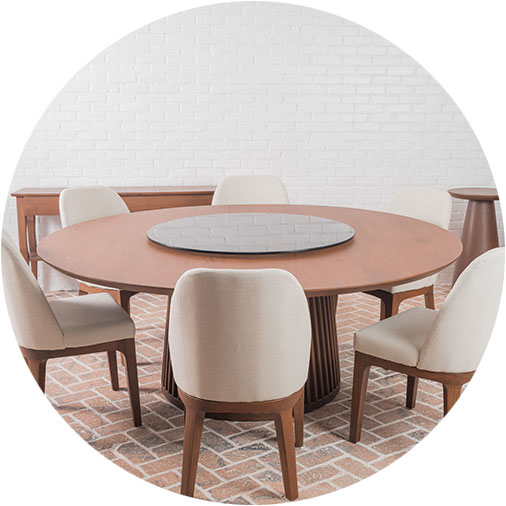 A dining room table with a white tablecloth.