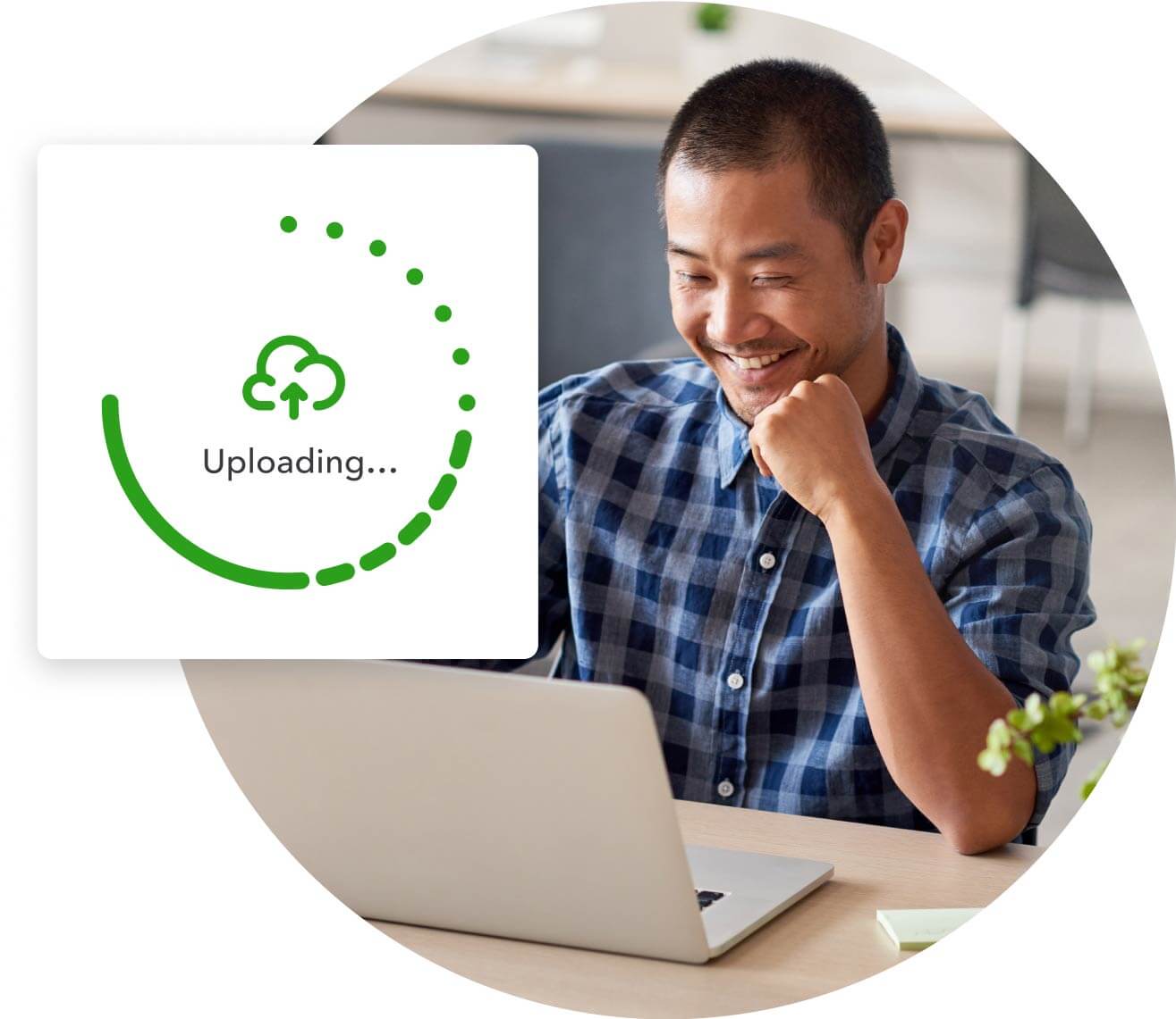 A person sitting on a laptop computer with a green background.
