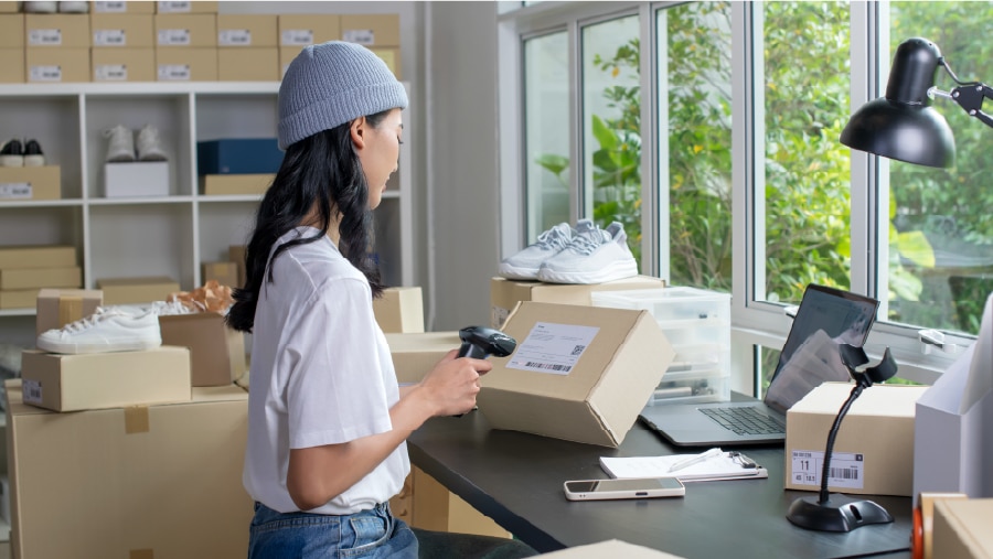 An employee scanning inventory.