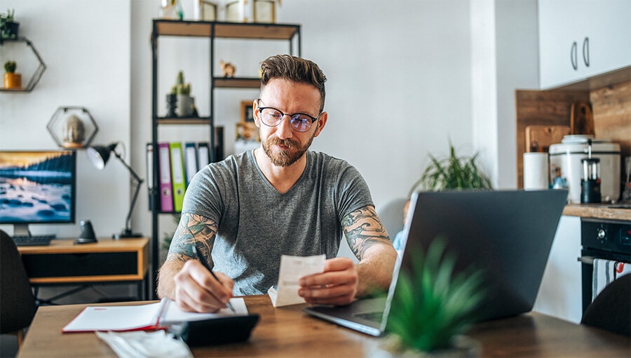 An image of a business owner researching what a journal entry is.