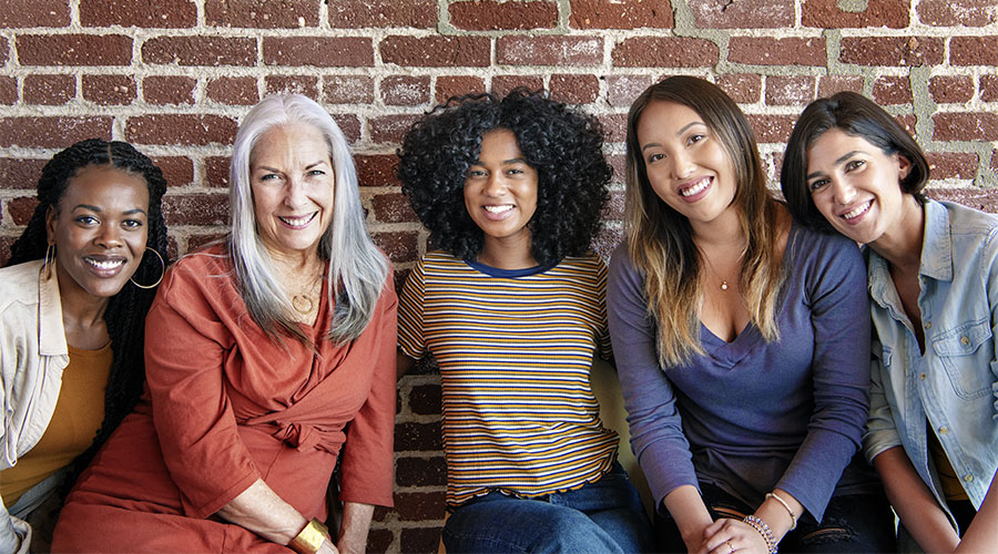 Female entrepreneurs posing together