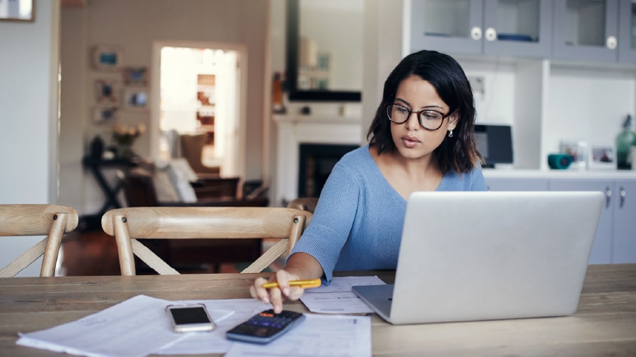 A business owner working on accounts payable.