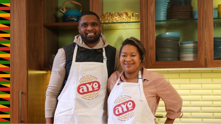 Ayo Foods co-founders standing in a kitchen.