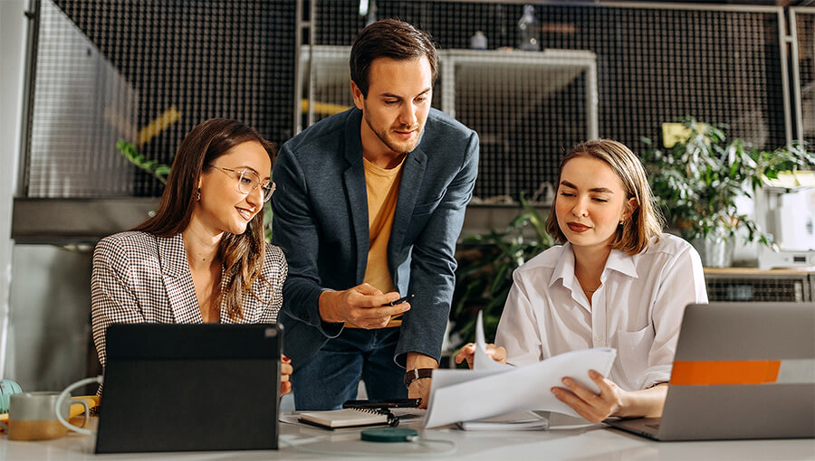 Three people discuss multi-entity accounting strategy.