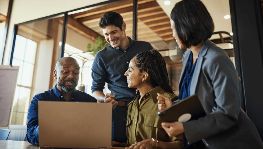 Photo of a diverse team collaborating on a marketing campaign.