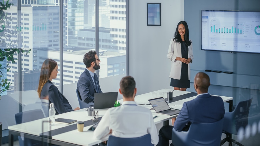 A group of people sitting around a table.