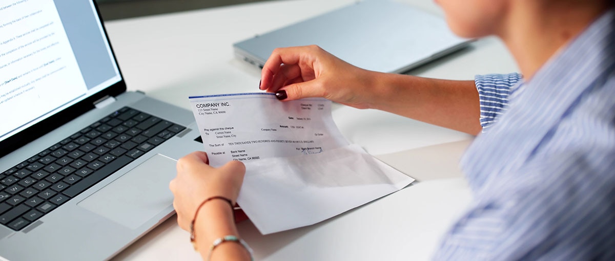 A business owner learning how to set up payroll for their small business.
