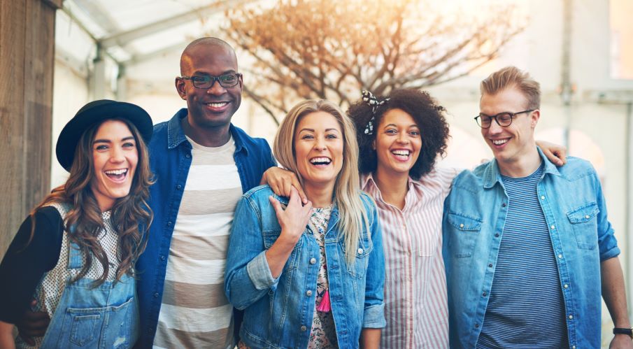 A group of people standing next to each other.