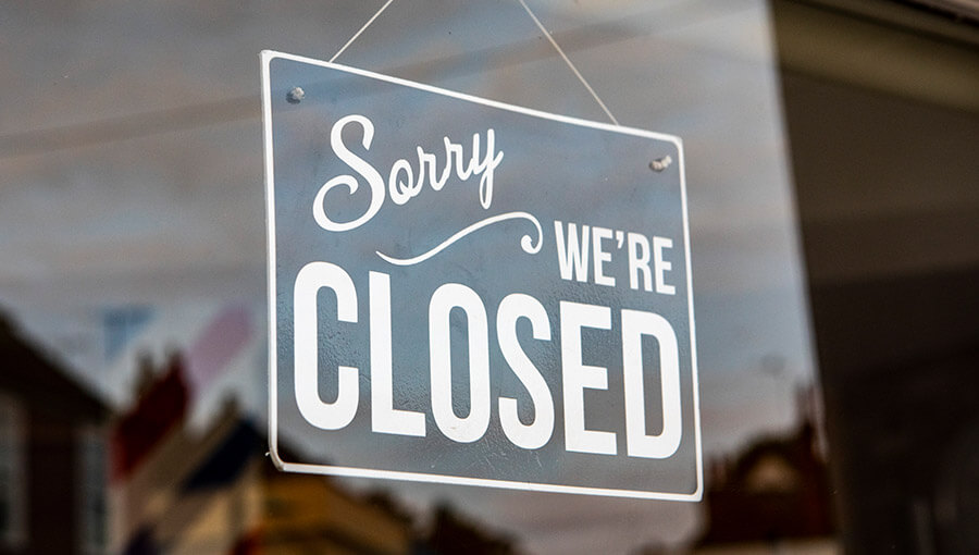 A person learning how to close a business.