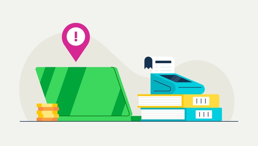 An image showing a stack of accounting books and tools illustrating when common accounting errors could occur.