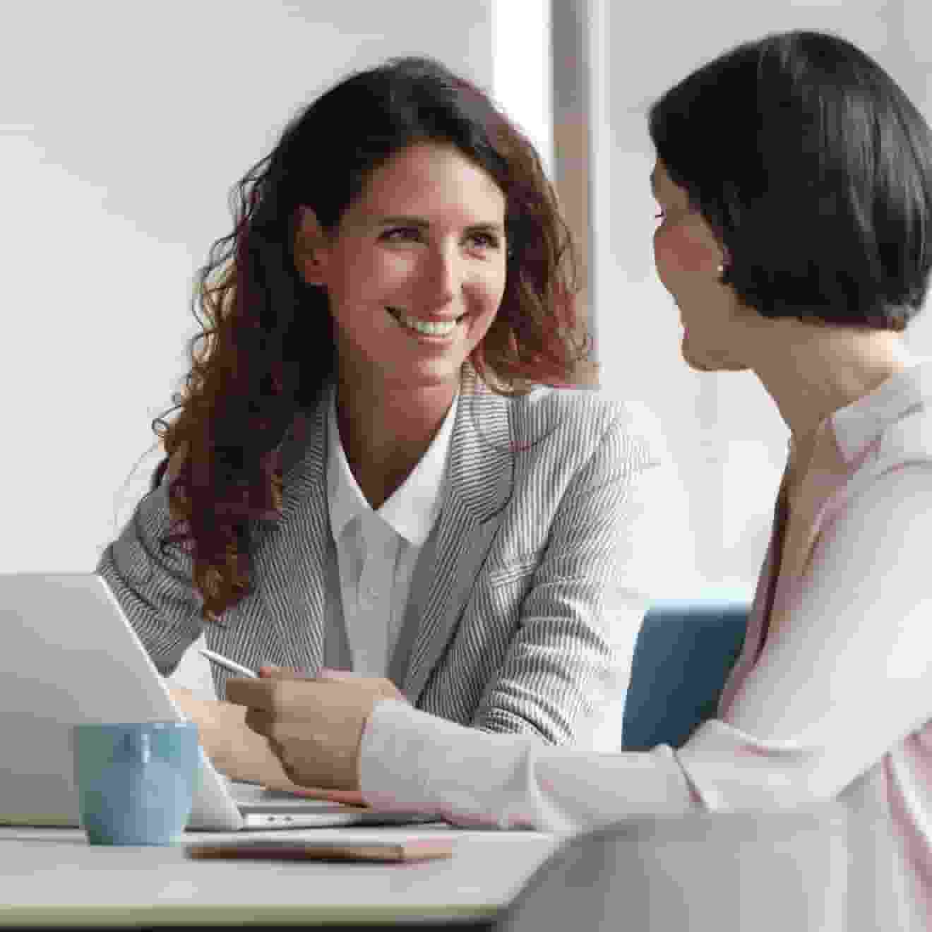 Female accountant talking with client
