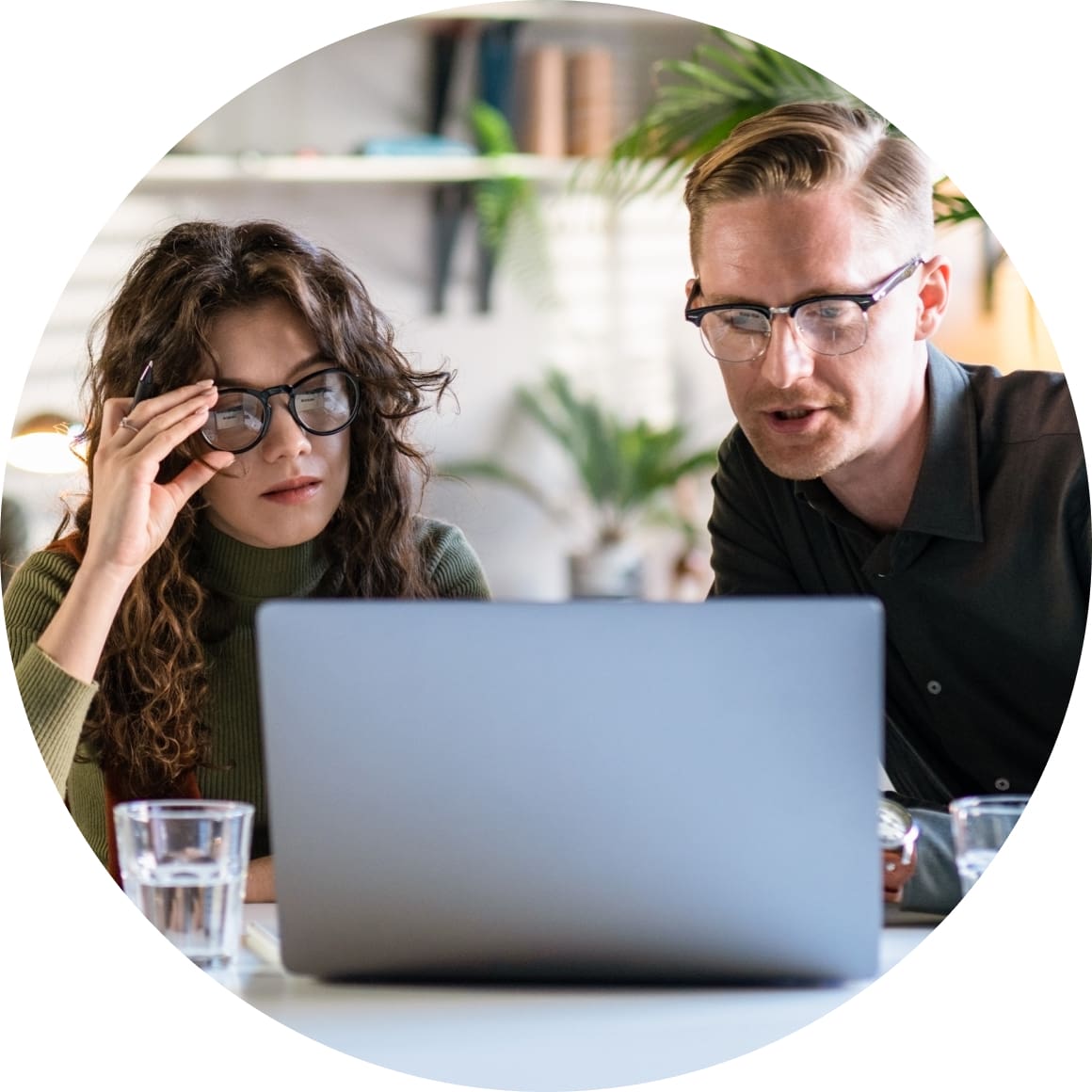 Accountant with client working laptop