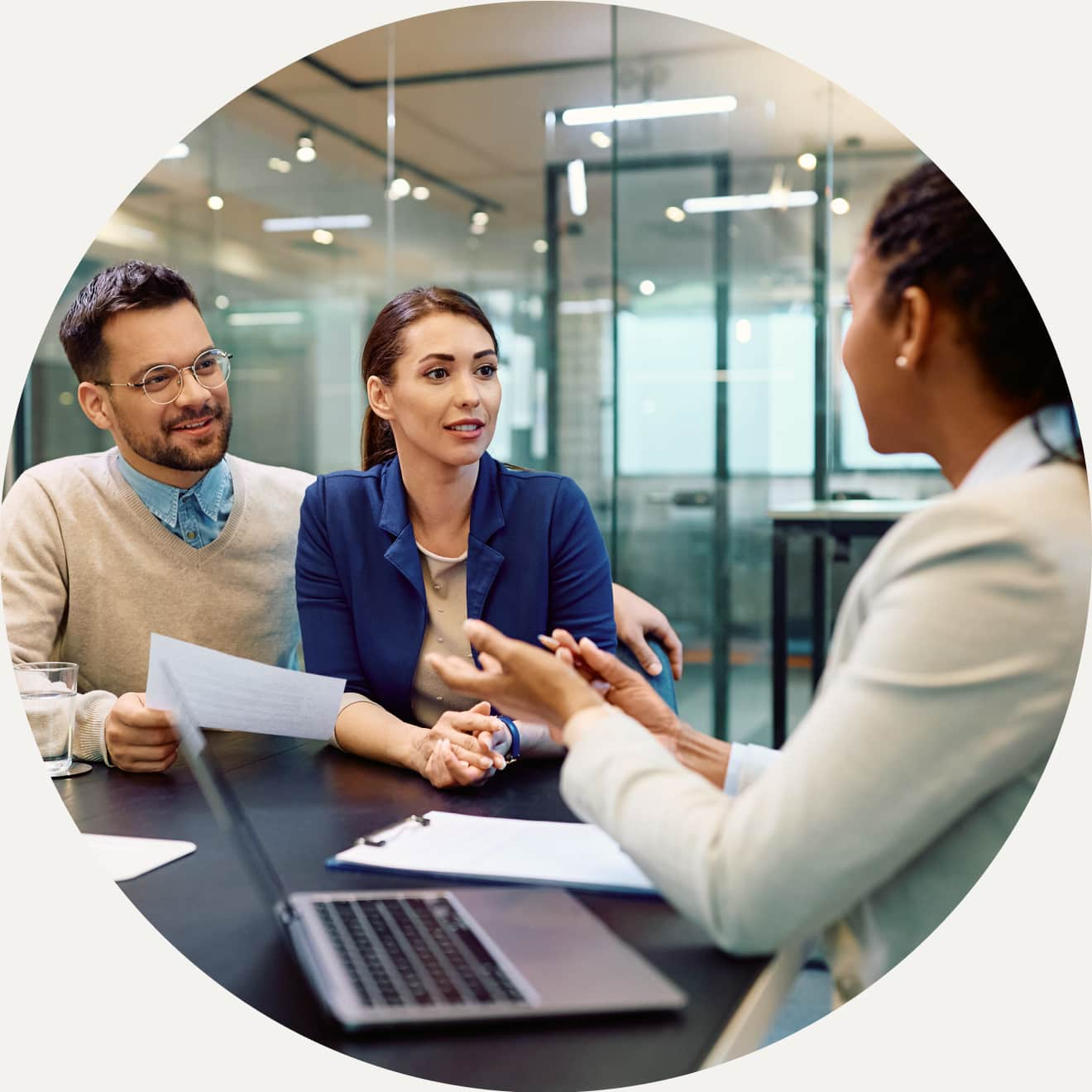 Accountant interacting with clients working on a laptop using QuickBooks Enterprise Accountant edition