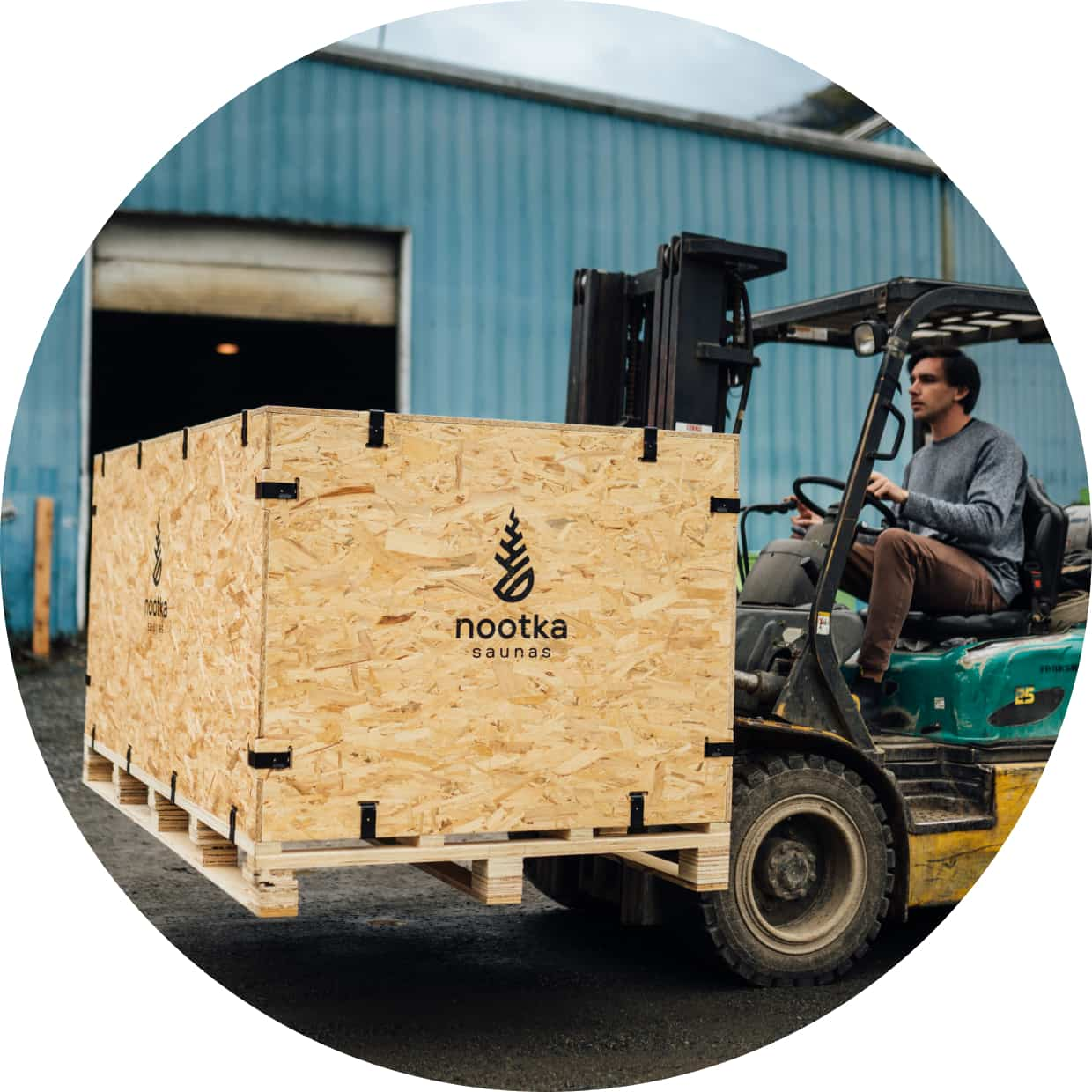 QuickBooks customer employee driving forklift at warehouse location