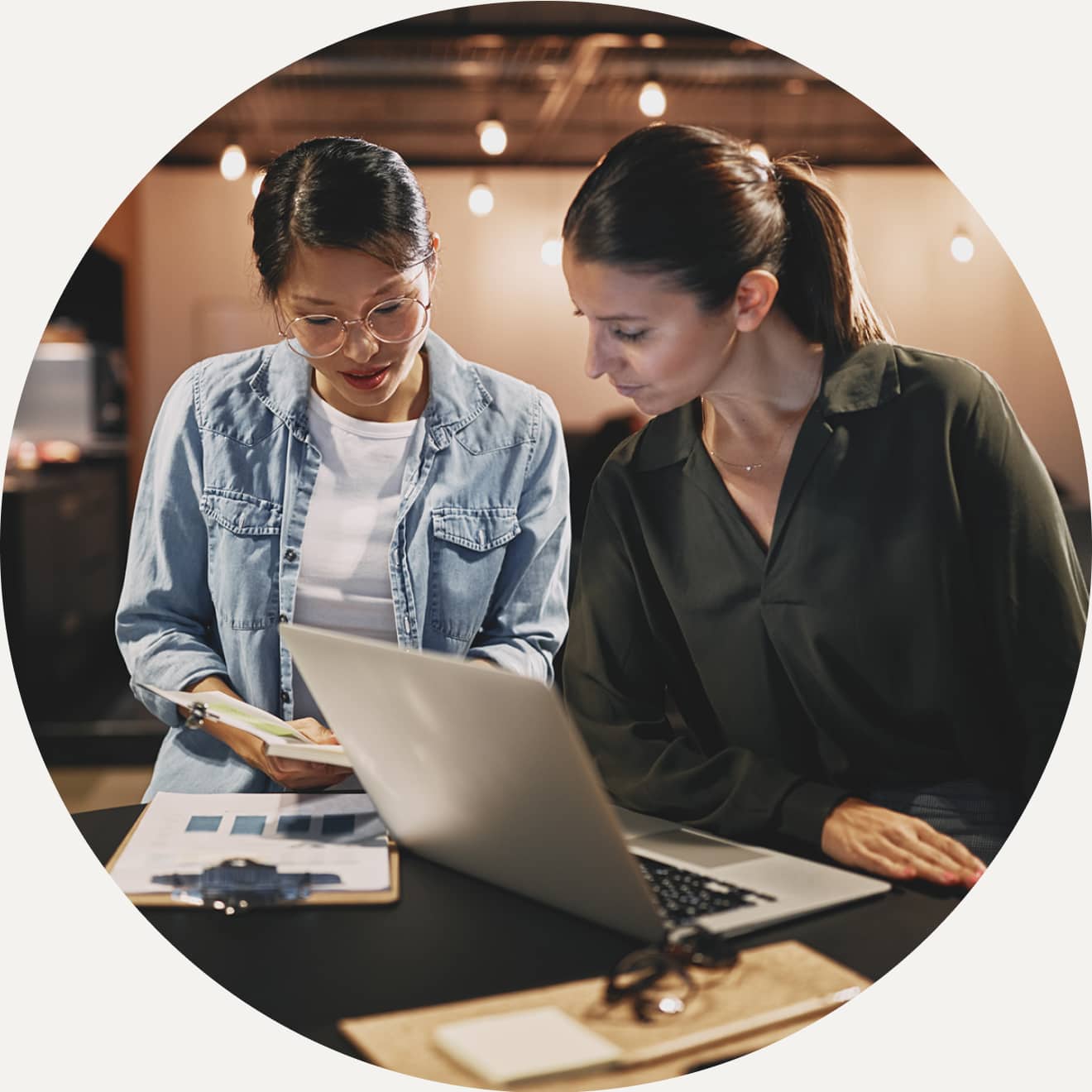 Women working on a laptop using QuickBooks Enterprise Nonprofit edition