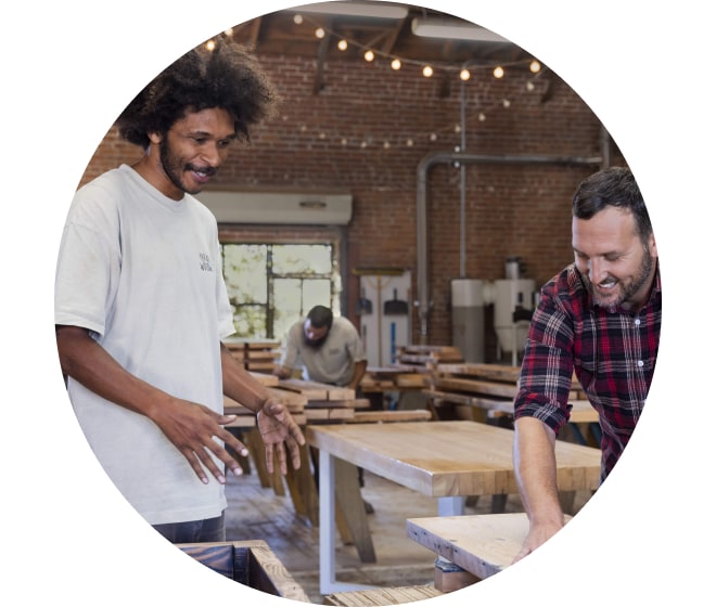 Employees working in a workshop together.