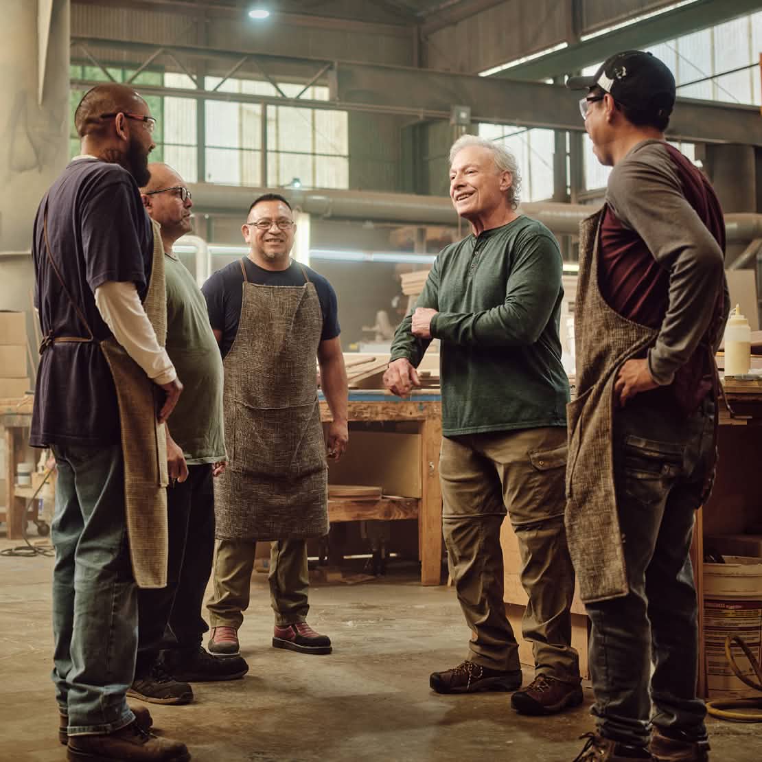 A picture of a team talking in a group